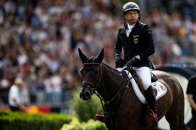 August 16, 2026: Michael Jung of Germany and his horse fischerChipmunk celebrate after winning gold in the Eventing Show Jumping Final on Day 6 of the 2026 FEI World Championships on August 16, 2026 in Aachen. Photo by Emma Wallskog, BILDBYRAN, code EW EW0687. equestrian sports, riding, 2026 World Championships, 2026 FEI World Championships, BBENG, equestrian sports, World Championships, eventing, celebration  Copyright: EMMAxWALLSKOG BB260816EW048