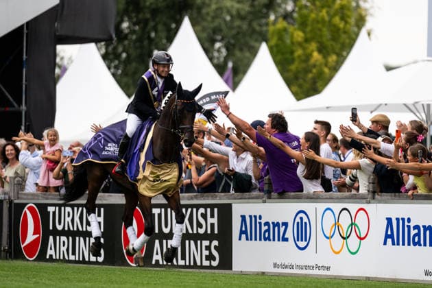 August 16, 2026: Michael Jung of Germany, riding fischerChipmunk, celebrates with fans after winning gold in the Eventing Show Jumping Final on Day 6 of the 2026 FEI World Championships on August 16, 2026 in Aachen. Photo by Emma Wallskog. BILDBYRAN code EW EW0687. equestrian sports, riding, 2026 World Championships, 2026 FEI World Championships, BBENG, equestrian sports, World Championships, eventing, celebration, audience  Copyright: EMMAxWALLSKOG BB260816EW050