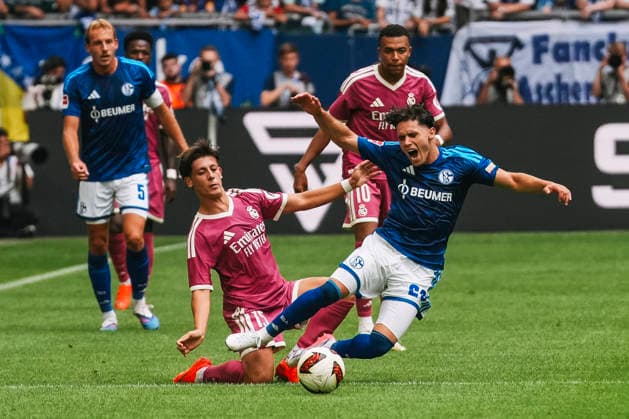 August 16, 2026, xjmrgnx, Soccer Friendly Match, FC Schalke 04 vs. Real Madrid: A tackle between Arda Güler, 15, Real Madrid and Soufiane El Faouzi (23), Schalke. DFL and DFB regulations prohibit any use of photographs as image sequences and or quasi-video. Gelsenkirchen