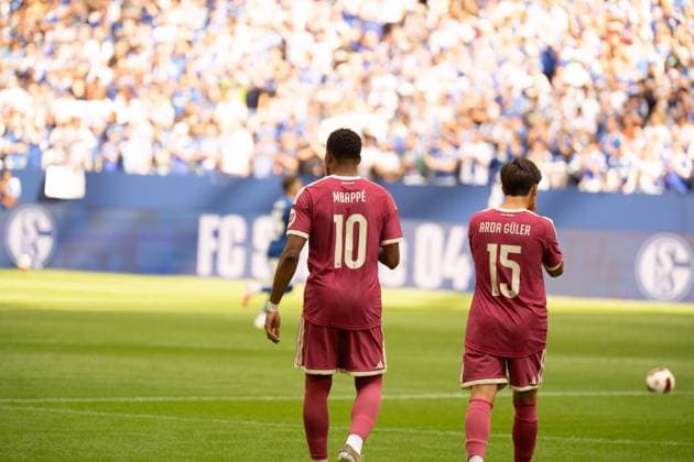 August 16, 2026: Soccer – FC Schalke 04 vs. Real Madrid, friendly match at the Veltins Arena in Gelsenkirchen. Kylian Mbappé (Real Madrid, No. 10) and Arda Güler (Real Madrid, 15 together shortly before kickoff IMPORTANT NOTICE In accordance with DFL and DFB regulations, it is prohibited to use or allow the use of photographs taken in the stadium and or during the game in the form of sequential images and or video-like photo series Copyright: xJamesxZabelx