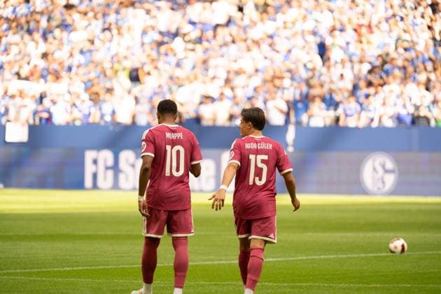 August 16, 2026: Soccer – FC Schalke 04 vs. Real Madrid, friendly match at the Veltins Arena in Gelsenkirchen. Kylian Mbappé (Real Madrid, No. 10) and Arda Güler (Real Madrid, 15 together shortly before kickoff IMPORTANT NOTICE In accordance with DFL and DFB regulations, it is prohibited to use or allow the use of photographs taken in the stadium and or during the game in the form of sequential images and or video-like photo series Copyright: xJamesxZabelx