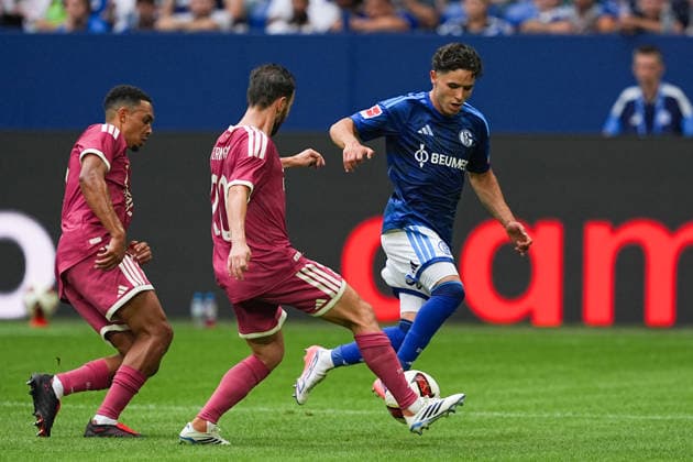 August 16, 2026, xydrx, Men s, Soccer, Friendly Match, FC Schalke 04 vs. Real Madrid, 2026–2027 Season, Veltins Arena: Soufiane El Faouzi (FC Schalke 04), No. 23, in a tackle against Trent Alexander-Arnold (Real Madrid), No. 12, and Bernardo Silva (Real Madrid), No. 20. DFB regulations prohibit any use of photographs as image sequences and or quasi-video. Copyright: HMBxMedia YannisxDreimann