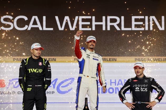 Jake Dennis (GBR) in second place, World Champion Pascal Wehrlein (GER) in his Porsche, and Mitch Evans, third in the World Championship, on the podium, FIA Formula E World Championship, Season 12, London E-Prix, August 16, 2026, Excel Exhibition Center, Race 2