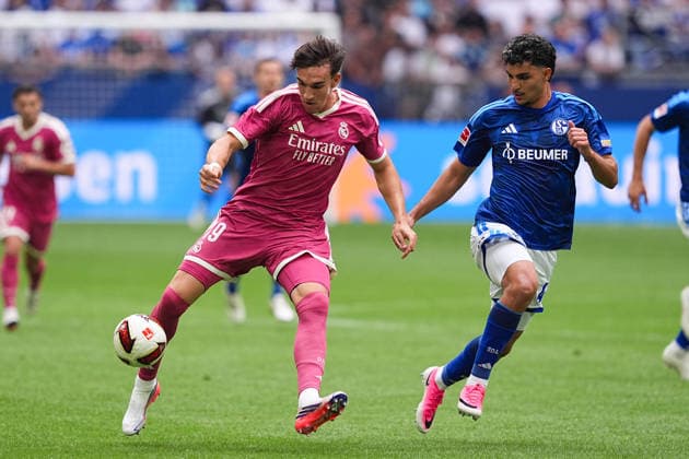 August 16, 2026, xydrx, Men s, Soccer, Friendly Match, FC Schalke 04 vs. Real Madrid, 2026–2027 Season, Veltins Arena, Carlos Espi (Real Madrid), 19, in a tackle against Mertcan Ayhan (FC Schalke 04), 43. DFB regulations prohibit any use of photographs as image sequences and or quasi-video. Copyright: HMBxMedia YannisxDreimann