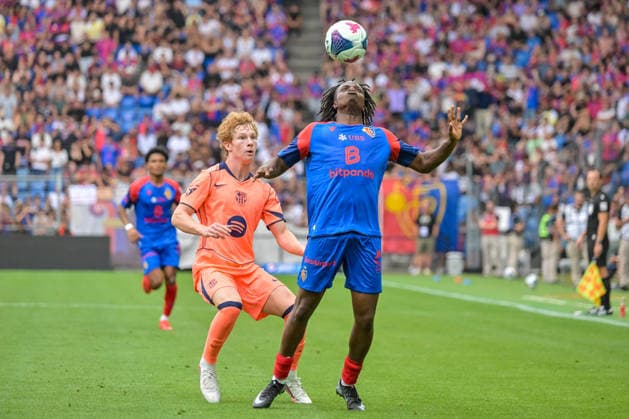 Evann Seyram Junior, FC Basel, 42 with the ball; Jordi Pesquer, FC Barcelona, 26 GER; FC Basel vs. FC Barcelona, soccer, friendly match, 2026–2027 season, August 16, 2026 GER, FC Basel vs. FC Barcelona, soccer, friendly match, 2026–2027 season, August 16, 2026 Basel Copyright: xEibner-Pressefotox EP_THS