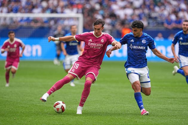 August 16, 2026, xydrx, Men s, Soccer, Friendly Match, FC Schalke 04 vs. Real Madrid, 2026–2027 Season, Veltins Arena, Carlos Espi (Real Madrid), 19, in a tackle against Mertcan Ayhan (FC Schalke 04), 43. DFB regulations prohibit any use of photographs as image sequences and or quasi-video. Copyright: HMBxMedia YannisxDreimann