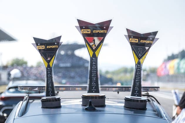 August 16, 2026, GER, Motorsports, ADAC DTM, 2026 Season, Nürburgring: DTM eSports winner’s trophies on the roof of a CUPRA Formentor on the starting grid for Sunday’s DTM race at the Nürburgring, Rhineland-Palatinate, Germany Copyright: xnordphotoxGmbHx xKnabx