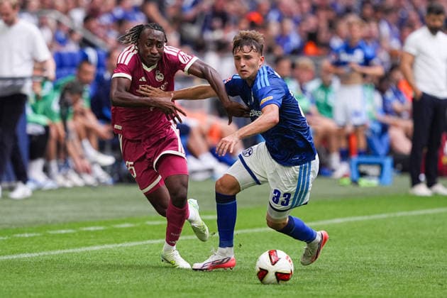 August 16, 2026, xydrx, Men s, Soccer, Friendly Match, FC Schalke 04 vs. Real Madrid, 2026–2027 Season, Veltins Arena, Yan Diomande (Real Madrid), No. 25 in a tackle against Vitalie Becker (FC Schalke 04), No. 33. DFB regulations prohibit any use of photographs as image sequences and or quasi-video. Copyright: HMBxMedia YannisxDreimann