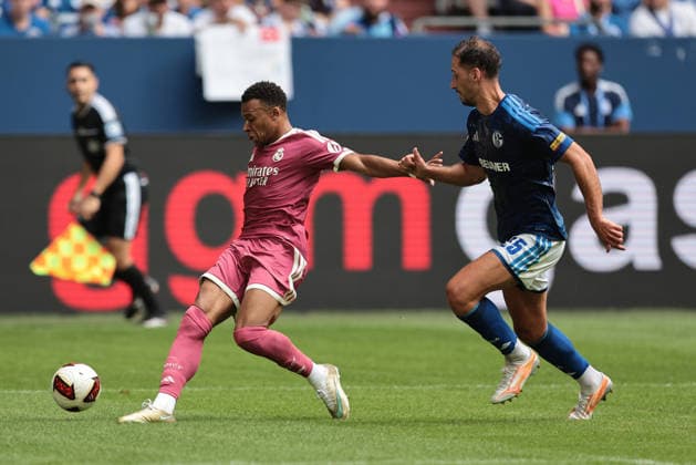 Kylian Mbappé of Real Madrid and Nikola Katic of FC Schalke 04 during the friendly match between FC Schalke 04 and Real Madrid CF. Copyright Thomas Pakusch Copyright: Thomas Pakusch
