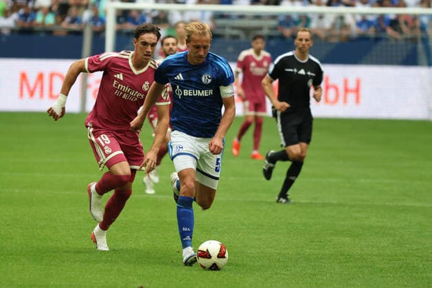 Carlos Espi of Real Madrid and Timo Becker of FC Schalke 04 during the friendly match between FC Schalke 04 and Real Madrid CF. Copyright Thomas Pakusch Copyright: Thomas Pakusch