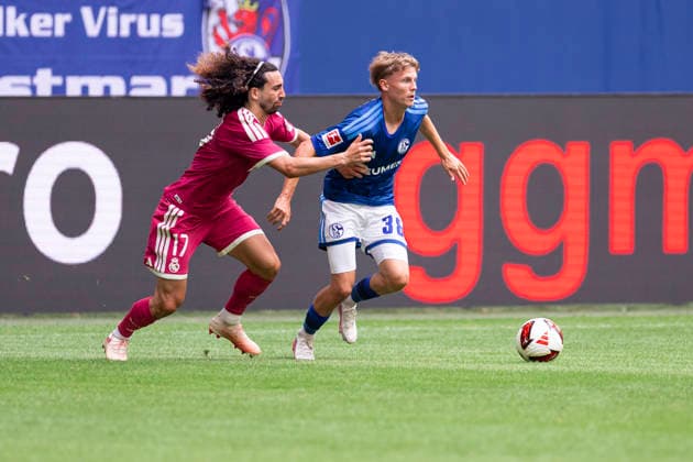August 15, 2026, Soccer, Friendly Match: FC Schalke 04 vs. Real Madrid CF; Marc Cucurella (Real Madrid CF), Luca Vozar (FC Schalke 04); Gelsenkirchen, Veltins Arena, North Rhine-Westphalia, Germany; xRHR; PHOTO: DEx Copyright: DennisxEwert RHR-FOTOx RHR-FOTO DE