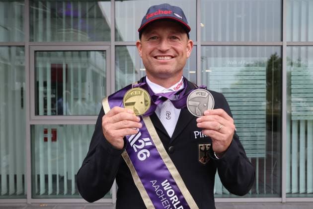 World Champion Michael Jung (GER) with his medals: gold in the individual competition, silver in the team competition, eventing, FEI Eventing World Championship, DHL Prize, individual and team events, Aachen FEI World Championships 2026, World Festival of Equestrian Sports, 2026 World Equestrian Games, Aachen 2026, Welcome Home 2026, Aachen Soers, August 11–23, 2026, Equestrian Sports, August 16, 2026, Aachen Soers, Germany