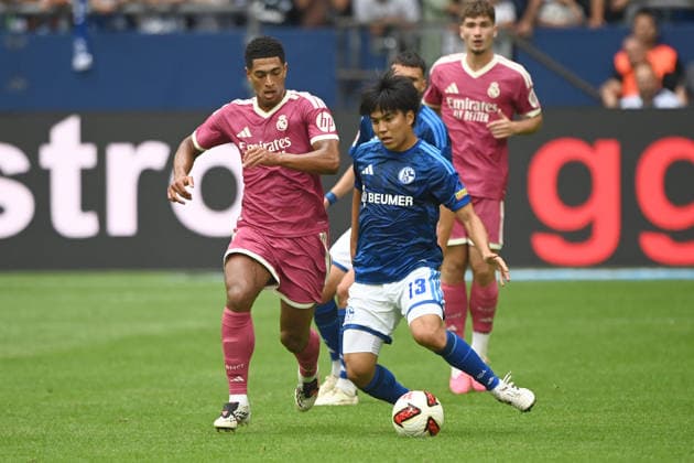 Satoshi TANAKA GE vs. Jude BELLINGHAM, Real Madrid: Action, Tackle, Soccer Friendly Match: FC Schalke 04 vs. Real Madrid 0–3 on August 16, 2026, at the Veltins Arena in Gelsenkirchen, Germany. DFL regulations prohibit any use of photographs as image sequences and or quasi-video.