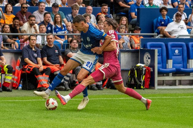 Dejan Ljubicic (FC Schalke 04), 21, vs. Alvaro Carreras (Real Madrid), 18, GER FC Schalke 04 vs. Real Madrid, Soccer Club Friendly Matches 2026–27, Week 33, August 16, 2026, GER FC Schalke 04 vs. Real Madrid, Soccer Club Friendly Matches 2026–27, Week 33, August 16, 2026, Gelsenkirchen Copyright: xEibner-Pressefoto FabianxFriesex EP_FFE