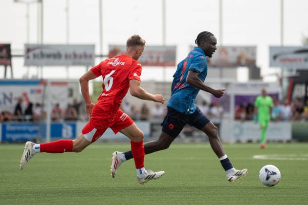 KERZERS, FRIBOURG, SWITZERLAND - AUGUST 16: Aurel Gutknecht of FC Kerzers challenges Josias Lukembila of FC Sion during the Swiss Cup first round match between FC Kerzers and FC Sion at Stadion Erli on August 16, 2026 in Kerzers, Fribourg, Switzerland. Copyright: xLivioxBaeriswylx xSPPx Sportspressphoto_SPR209025