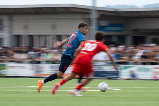 KERZERS, FRIBOURG, SWITZERLAND - AUGUST 16: Donat Rudhani of FC Sion challenges Armando Waeber of FC Kerzers during the Swiss Cup first round match between FC Kerzers and FC Sion at Stadion Erli on August 16, 2026 in Kerzers, Fribourg, Switzerland. Copyright: xLivioxBaeriswylx xSPPx Sportspressphoto_SPR209042
