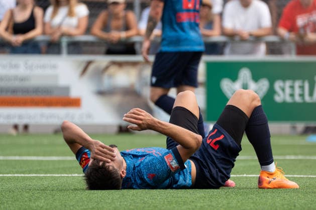 KERZERS, FRIBOURG, SWITZERLAND - AUGUST 16: Donat Rudhani of FC Sion lies on the pitch after being fouled during the Swiss Cup first round match between FC Kerzers and FC Sion at Stadion Erli on August 16, 2026 in Kerzers, Fribourg, Switzerland. Copyright: xLivioxBaeriswylx xSPPx Sportspressphoto_SPR209045