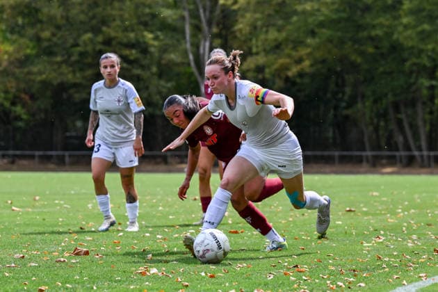 August 16, 2026, Soccer, 2026–2027 DFB Women s Cup Playoffs, Fortuna Cologne vs. SG 99 Andernach. Emma Gumbel of Fortuna Cologne tries to stop Vanessa Zilligen (No. 15, Andernach) from advancing.