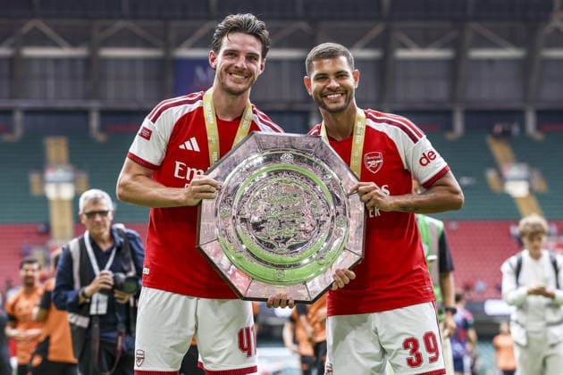 CARDIFF, WALES, AUG 16: Declan Rice and Bruno Guimaraes of Arsenal celebrates with trophy after Arsenal win the FA Community Shield match between Arsenal and Manchester City at the Millennium Stadium in Cardiff, Wales on 16th of August (photo by Qian Jun Sports Press Photo) Copyright: xQianxJun SportsxPressxPhotox Sportspressphoto_SPR209514