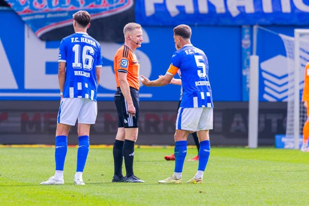 German 3rd Division, 2026–2027 Season, August 16, 2026, Matchday 2, FC Hansa Rostock vs. Waldhof Mannheim, Ostseestadion Schuster, Marco (FC Hansa Rostock), 5, Weller, Felix (Referee) Copyright: xMichellexLukax