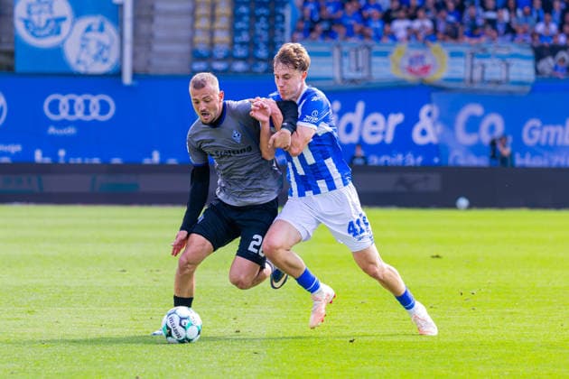 German 3rd Division, 2026–2027 Season, August 16, 2026, Matchday 2, FC Hansa Rostock vs. Waldhof Mannheim, Ostseestadion Asallari, Kushtrim Waldhof Mannheim, 20 in a tackle against Michaelis, Yannick FC Hansa Rostock, 41 Copyright: xMichellexLukax