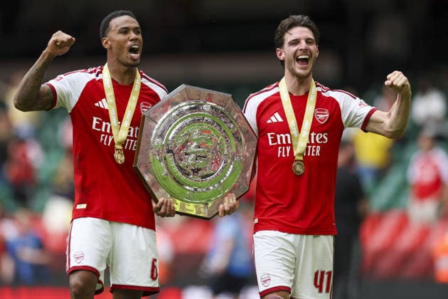 CARDIFF, WALES, AUG 16: Gabriel Magalhães and Declan Rice of Arsenal celebrate with trophy after Arsenal win the FA Community Shield match between Arsenal and Manchester City at the Millennium Stadium in Cardiff, Wales on 16th of August (photo by Qian Jun Sports Press Photo) Copyright: xQianxJun SportsxPressxPhotox Sportspressphoto_SPR209573