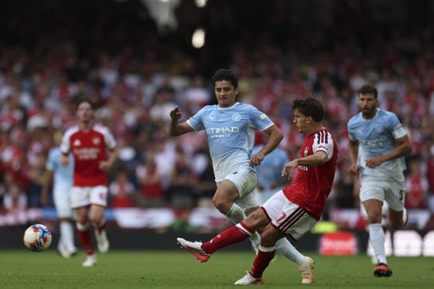 CARDIFF, WALES, AUG 16: Christos Tzolis of Arsenal passes the ball during the FA Community Shield match between Arsenal and Manchester City at the Millennium Stadium in Cardiff, Wales on 16th of August (photo by Qian Jun Sports Press Photo) Copyright: xQianxJun SportsxPressxPhotox Sportspressphoto_SPR209581