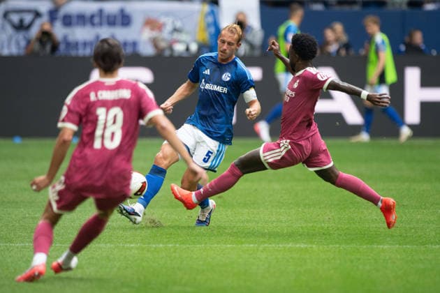 Timo BECKER (GE) vs. Alvaro CARREROS (Real Madrid) and Vinicius JUNIOR (Real Madrid) – Action, Tackle, Soccer Friendly Match: FC Schalke 04 vs. Real Madrid 0–3 on August 16, 2026, at the Veltins Arena in Gelsenkirchen, Germany. DFL regulations prohibit any use of photographs as image sequences and or quasi-video.