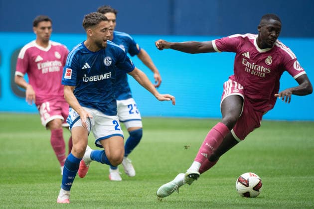 Adil AOUCHICHE (GE) vs. Ibrahima KONATE (Real Madrid) – Action, Tackle, Soccer Friendly Match: FC Schalke 04 vs. Real Madrid 0–3 on August 16, 2026, at the Veltins Arena in Gelsenkirchen, Germany. DFL regulations prohibit any use of photographs as image sequences and or quasi-video.