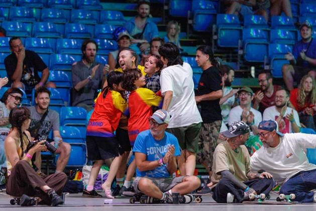 World Freestyle Skateboarding Championships - Finals 2026. Germany - Kassel, 16.08.2026 Carmen Ionita from Romania (c) celebrates with her team colleagues during the Women Pro finals as the third and final day of the World Freestyle Skateboarding Championships brings together freestyle skateboarding, urban culture, art, music and lifestyle at Messe Kassel. The event features international skateboarding competitions alongside graffiti, live music, BMX, workshops, exhibitions and other elements of the global freestyle and street culture community. Hesse