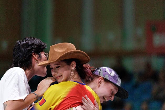 World Freestyle Skateboarding Championships - Finals 2026. Germany - Kassel, 16.08.2026 Casse Duhem from France (l),Carmen Ionita from Romania (r) and Freya Ruske from Germany (c) celebrate during the Women Pro finals as the third and final day of the World Freestyle Skateboarding Championships brings together freestyle skateboarding, urban culture, art, music and lifestyle at Messe Kassel. The event features international skateboarding competitions alongside graffiti, live music, BMX, workshops, exhibitions and other elements of the global freestyle and street culture community. Hesse