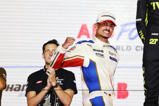 World Champion Pascal Wehrlein (GER) of Porsche emotionally clenches his fist on his way to the podium, Race 2, FIA Formula E World Championship, Season 12, London E-Prix, August 16, 2026, Excel Exhibition Center, World Champions Ceremony