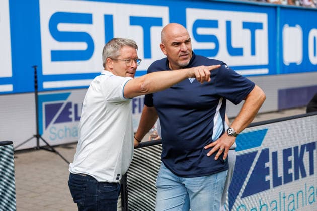 On the left, Chairman of the Board and Managing Director Ronald Maul of Rostock with Sports Director Mathias Schober of Waldhof GER; FC Hansa Rostock vs. SV Waldhof Mannheim, soccer, men’s, 3rd Division, Matchday 2, 2026–2027 season, August 16, 2026, Rostock Ostseestadion, Mecklenburg-Western Pomerania, Germany