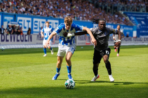Left: Bernie Lennemann (Rostock) vs. Darnell Keumo (Waldhof), GER; FC Hansa Rostock vs. SV Waldhof Mannheim; Soccer; Men; 3rd Division; Matchday 2; 2026–2027 Season; August 16, 2026, Rostock Ostseestadion, Mecklenburg-Western Pomerania, Germany