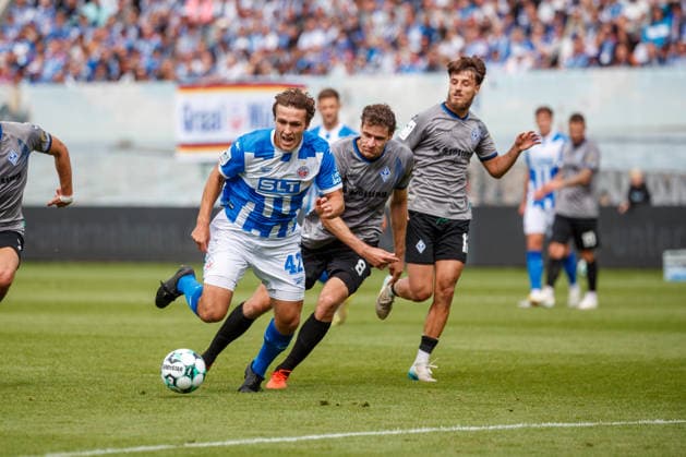 Left: Benno Dietze (Rostock) vs. Maximilian Thalhammer (Waldhof), FC Hansa Rostock vs. SV Waldhof Mannheim, Soccer, Men, 3rd Division, Matchday 2, 2026–2027 Season, August 16, 2026, Rostock Ostseestadion, Mecklenburg-Western Pomerania, Germany
