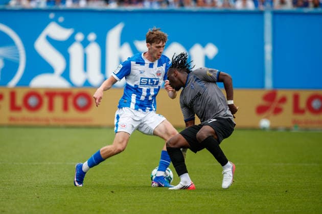 Left: Bernie Lennemann (Rostock) vs. Darnell Keumo (Waldhof GER), FC Hansa Rostock vs. SV Waldhof Mannheim, Soccer, Men, 3rd Division, Matchday 2, 2026–2027 Season, August 16, 2026, Rostock Ostseestadion, Mecklenburg-Western Pomerania, Germany