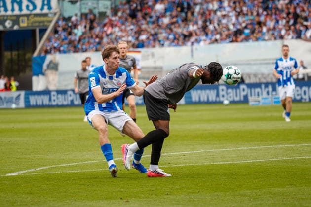 Left: Bernie Lennemann (Rostock) vs. Darnell Keumo (Waldhof GER), FC Hansa Rostock vs. SV Waldhof Mannheim, Soccer, Men, 3rd Division, Matchday 2, 2026–2027 Season, August 16, 2026, Rostock Ostseestadion, Mecklenburg-Western Pomerania, Germany