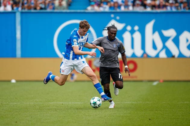 Left: Bernie Lennemann (Rostock) vs. Darnell Keumo (Waldhof GER), FC Hansa Rostock vs. SV Waldhof Mannheim, Soccer, Men, 3rd Division, Matchday 2, 2026–2027 Season, August 16, 2026, Rostock Ostseestadion, Mecklenburg-Western Pomerania, Germany