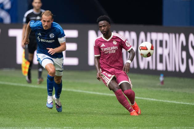 Vinicius JUNIOR (Real Madrid) vs. Timo BECKER (GE) – Action, Tackle, Soccer Friendly Match: FC Schalke 04 vs. Real Madrid 0–3 on August 16, 2026, at the Veltins Arena in Gelsenkirchen, Germany. DFL regulations prohibit any use of photographs as image sequences and or quasi-video.