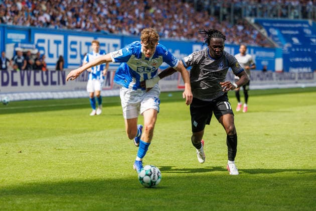 Left: Bernie Lennemann (Rostock) vs. Darnell Keumo (Waldhof GER), FC Hansa Rostock vs. SV Waldhof Mannheim, Soccer, Men, 3rd Division, Matchday 2, 2026–2027 Season, August 16, 2026, Rostock Ostseestadion, Mecklenburg-Western Pomerania, Germany