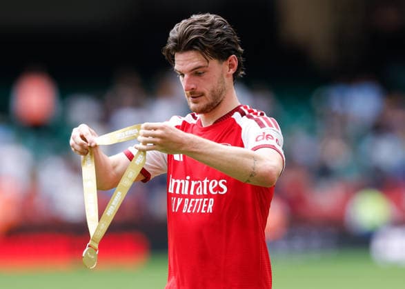 Cardiff, Wales, 16th August 2026. Declan Rice of Arsenal looks at his winners medal following the Arsenal vs Manchester City FA Community Shield match at Principality Stadium, Cardiff. Picture credit should read: Cody Froggatt Sportimage EDITORIAL USE ONLY. No use with unauthorised audio, video, data, fixture lists, club league logos or live services. Online in-match use limited to 120 images, no video emulation. No use in betting, games or single club league player publications. SPI_196_CF_ARSENAL_V_MANCHESTER_CITY SPI-4912-0196