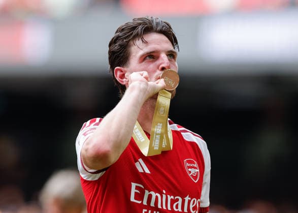 Cardiff, Wales, 16th August 2026. Declan Rice of Arsenal kisses his winners medal following the Arsenal vs Manchester City FA Community Shield match at Principality Stadium, Cardiff. Picture credit should read: Cody Froggatt Sportimage EDITORIAL USE ONLY. No use with unauthorised audio, video, data, fixture lists, club league logos or live services. Online in-match use limited to 120 images, no video emulation. No use in betting, games or single club league player publications. SPI_221_CF_ARSENAL_V_MANCHESTER_CITY SPI-4912-0221