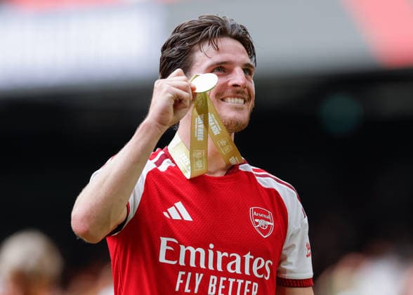 Cardiff, Wales, 16th August 2026. Declan Rice of Arsenal holds up his winners medal following the Arsenal vs Manchester City FA Community Shield match at Principality Stadium, Cardiff. Picture credit should read: Cody Froggatt Sportimage EDITORIAL USE ONLY. No use with unauthorised audio, video, data, fixture lists, club league logos or live services. Online in-match use limited to 120 images, no video emulation. No use in betting, games or single club league player publications. SPI_222_CF_ARSENAL_V_MANCHESTER_CITY SPI-4912-0222