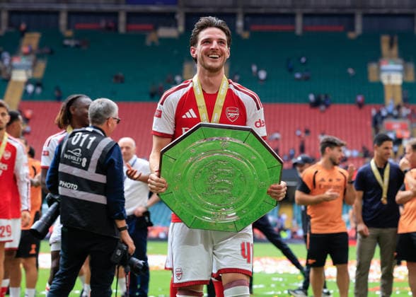 Cardiff, Wales, 16th August 2026. Declan Rice of Arsenal lifts the FA Community Shield trophy following the Arsenal vs Manchester City FA Community Shield match at Principality Stadium, Cardiff. Picture credit should read: Cody Froggatt Sportimage EDITORIAL USE ONLY. No use with unauthorised audio, video, data, fixture lists, club league logos or live services. Online in-match use limited to 120 images, no video emulation. No use in betting, games or single club league player publications. SPI_233_CF_ARSENAL_V_MANCHESTER_CITY SPI-4912-0233