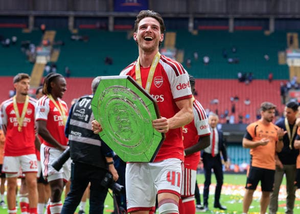 Cardiff, Wales, 16th August 2026. Declan Rice of Arsenal lifts the FA Community Shield trophy following the Arsenal vs Manchester City FA Community Shield match at Principality Stadium, Cardiff. Picture credit should read: Cody Froggatt Sportimage EDITORIAL USE ONLY. No use with unauthorised audio, video, data, fixture lists, club league logos or live services. Online in-match use limited to 120 images, no video emulation. No use in betting, games or single club league player publications. SPI_234_CF_ARSENAL_V_MANCHESTER_CITY SPI-4912-0234
