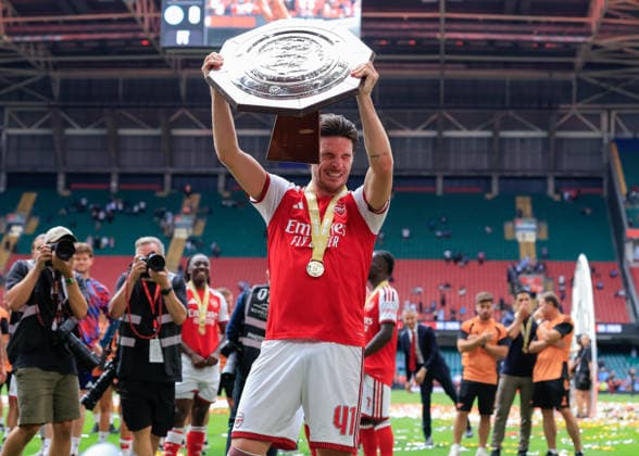 Cardiff, Wales, 16th August 2026. Declan Rice of Arsenal is hit in the face as he lifts the FA Community Shield trophy following the Arsenal vs Manchester City FA Community Shield match at Principality Stadium, Cardiff. Picture credit should read: Cody Froggatt Sportimage EDITORIAL USE ONLY. No use with unauthorised audio, video, data, fixture lists, club league logos or live services. Online in-match use limited to 120 images, no video emulation. No use in betting, games or single club league player publications. SPI_245_CF_ARSENAL_V_MANCHESTER_CITY SPI-4912-0245