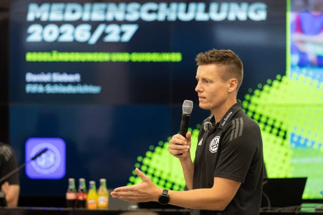 DFB Schiri GmbH Media Training: FIFA Referee Daniel Siebert explains the latest rule changes to the participants in the media training session. Information Session on Media Training for Referees on August 18, 2026, in Frankfurt am Main, Frankfurt am Main, Hesse, Germany, DFB Campus