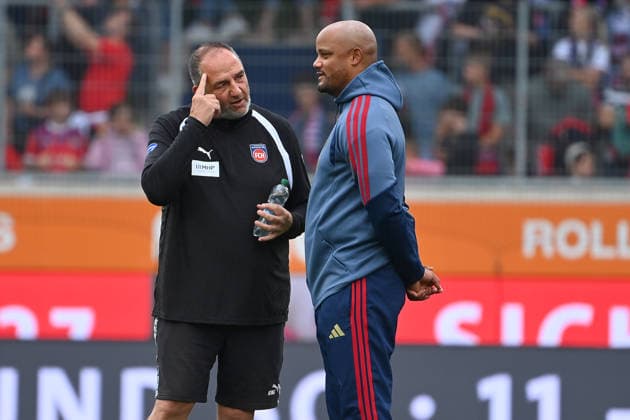 From left: Frank SCHMIDT, coach of Heidenheim; Vincent KOMPANY, coach of Bayern Munich. Soccer friendly match: 1. FC Heidenheim vs. FC Bayern Munich on August 18, 2025, at VOITH ARENA