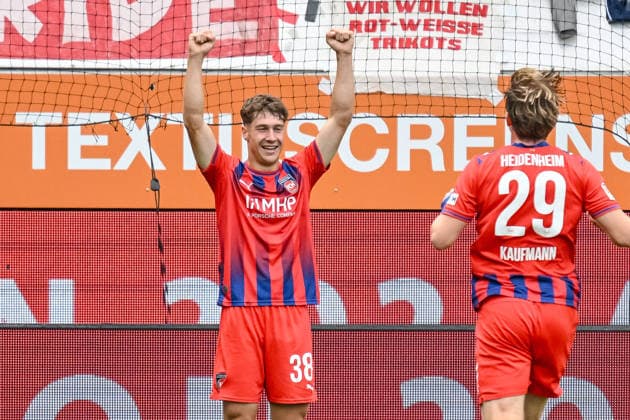 Yannik Wagner of 1 FC Heidenheim 1846 celebrates after scoring his team s first goal during the preseason friendly match between 1 FC Heidenheim and FC Bayern Munich at the Voith Arena on August 18, 2026, in Heidenheim, Germany. Photo by Harry Langer, DeFodi Images