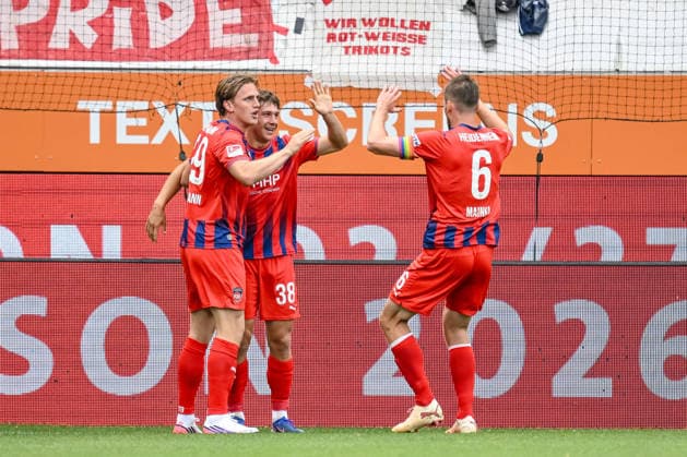 Yannik Wagner of 1 FC Heidenheim 1846 celebrates with his teammates after scoring his team s first goal during the preseason friendly match between 1 FC Heidenheim and FC Bayern Munich at the Voith Arena on August 18, 2026, in Heidenheim, Germany. Photo by Harry Langer, DeFodi Images